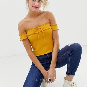 Bershka ribbed off shoulder top in orange yellow